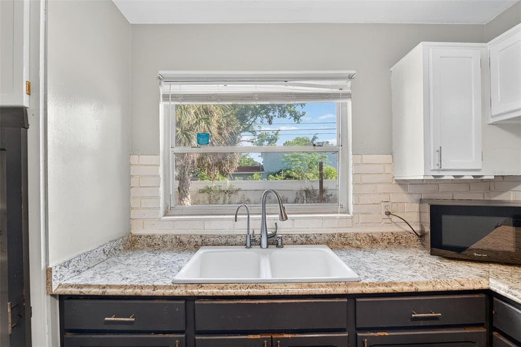 1557 79TH AVENUE, Street PETERSBURG, FL 33702 photo 4