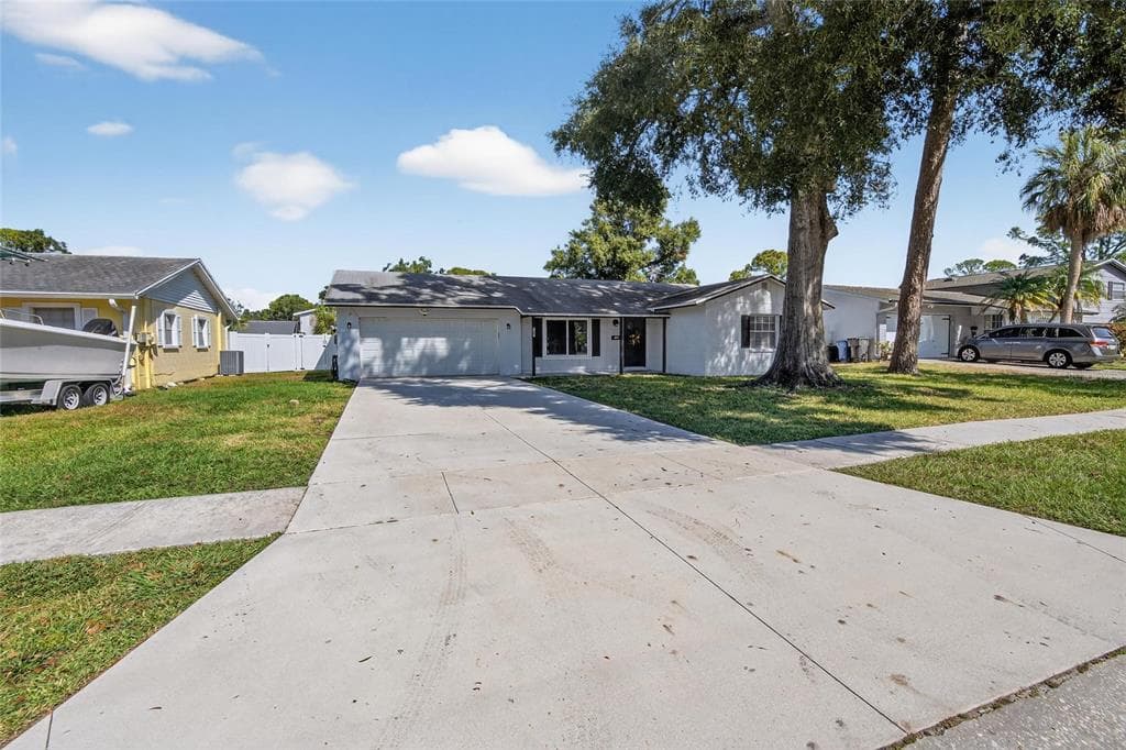 7909 WEST POCAHONTAS AVENUE, TAMPA, FL 33615 photo 3