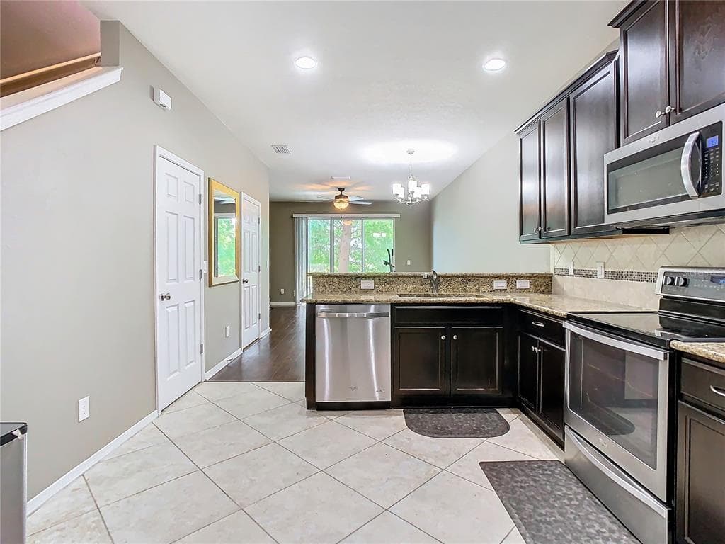 4907 WHITE SANDERLING Court, TAMPA, FL 33619 photo 5