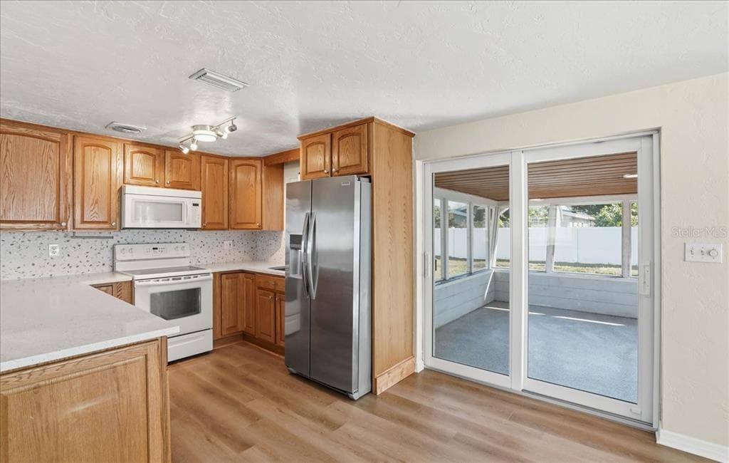 10416 ORANGE BLOSSOM LANE, SEMINOLE, FL 33772 photo 5