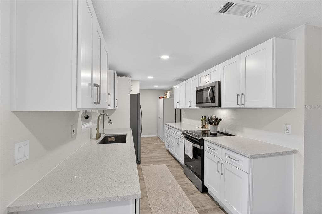 3706 MISTWOOD DRIVE, TAMPA, FL 33619 photo 3