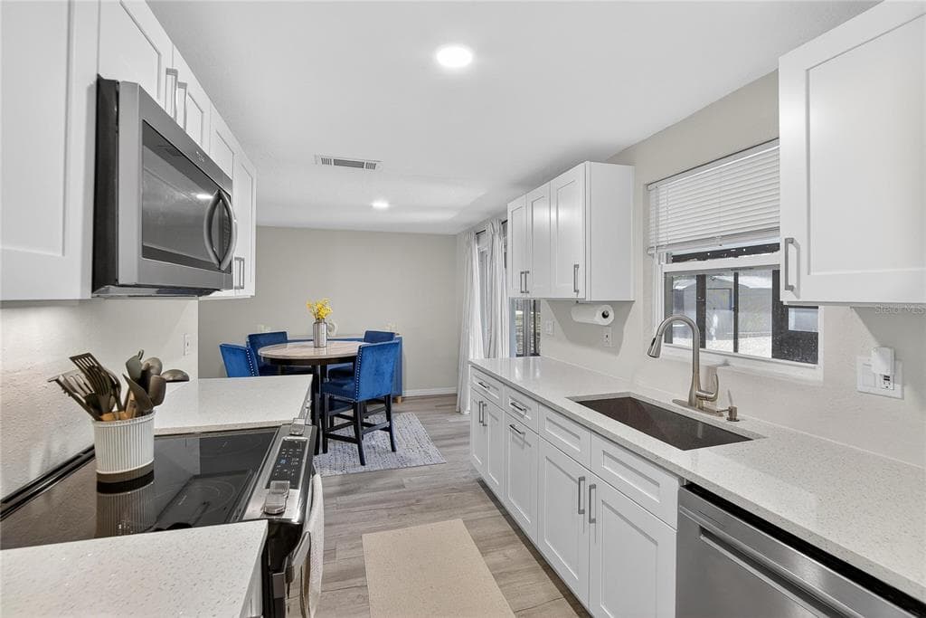 3706 MISTWOOD DRIVE, TAMPA, FL 33619 photo 4