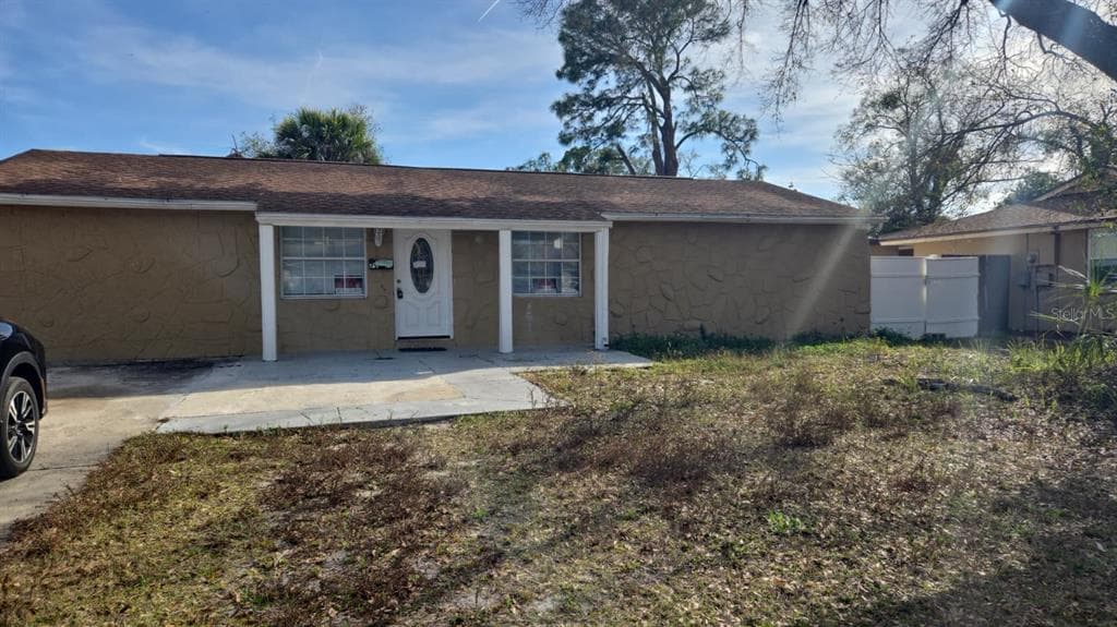 7914 WOODGROVE CIRCLE, TAMPA, FL 33615