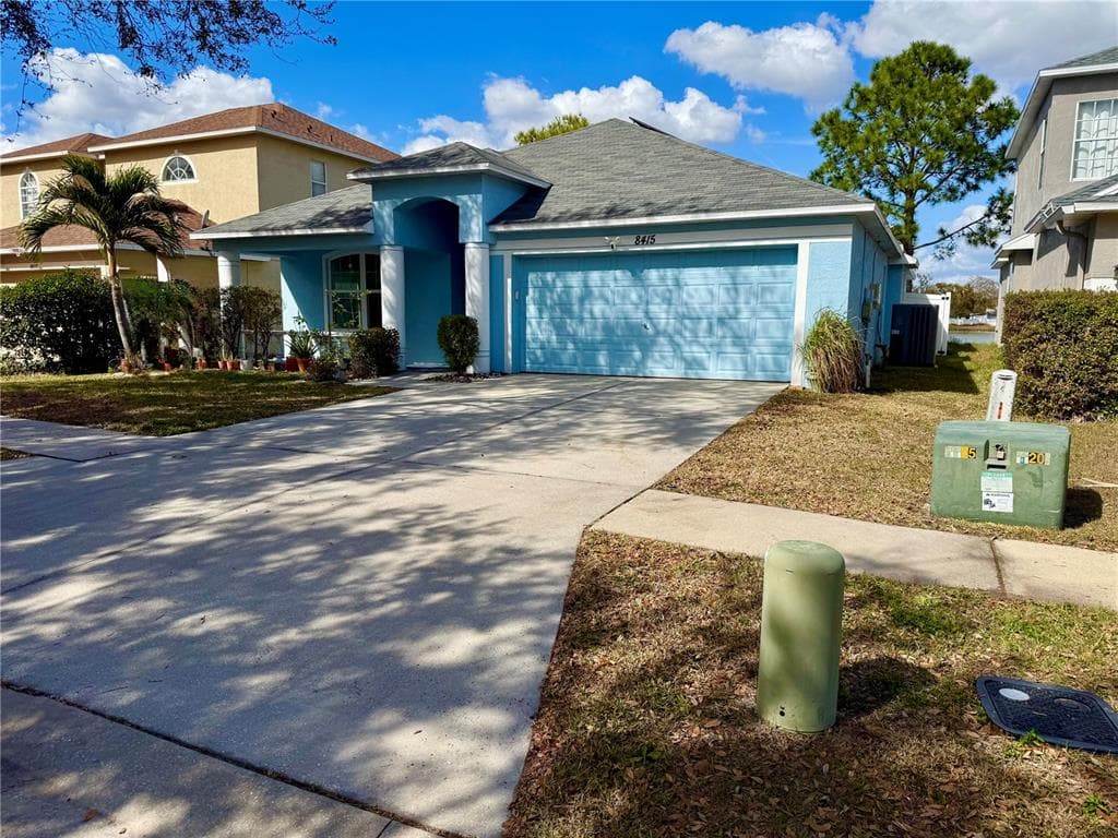 8415 CANTERBURY LAKE BOULEVARD, TAMPA, FL 33619 photo 2
