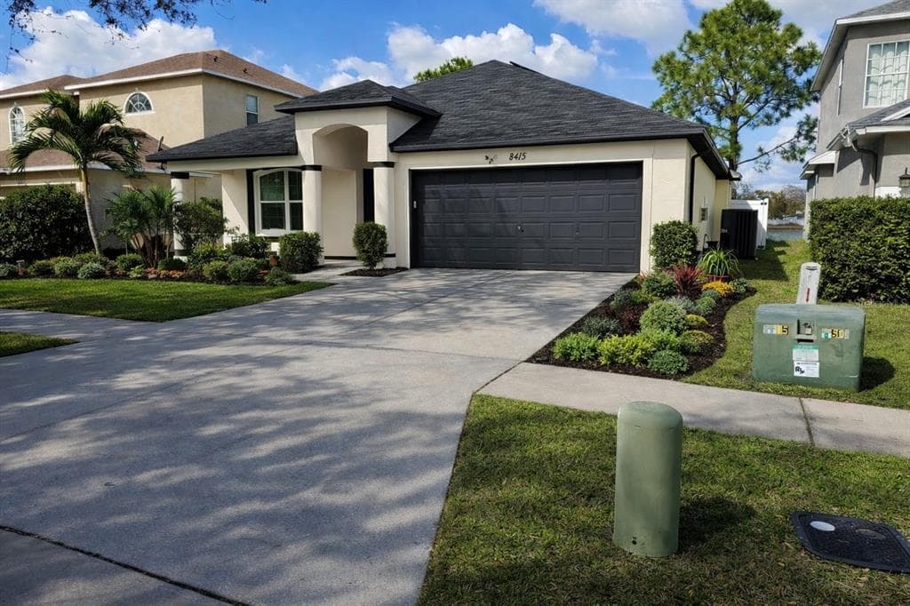 8415 CANTERBURY LAKE BOULEVARD, TAMPA, FL 33619 photo 3