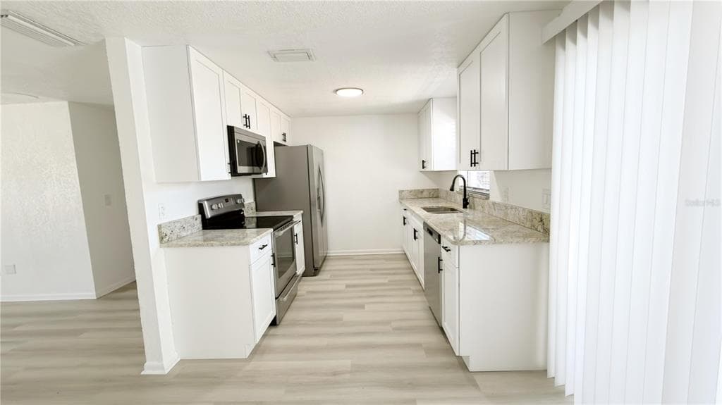 3602 TAMARIX DRIVE, TAMPA, FL 33619 photo 4