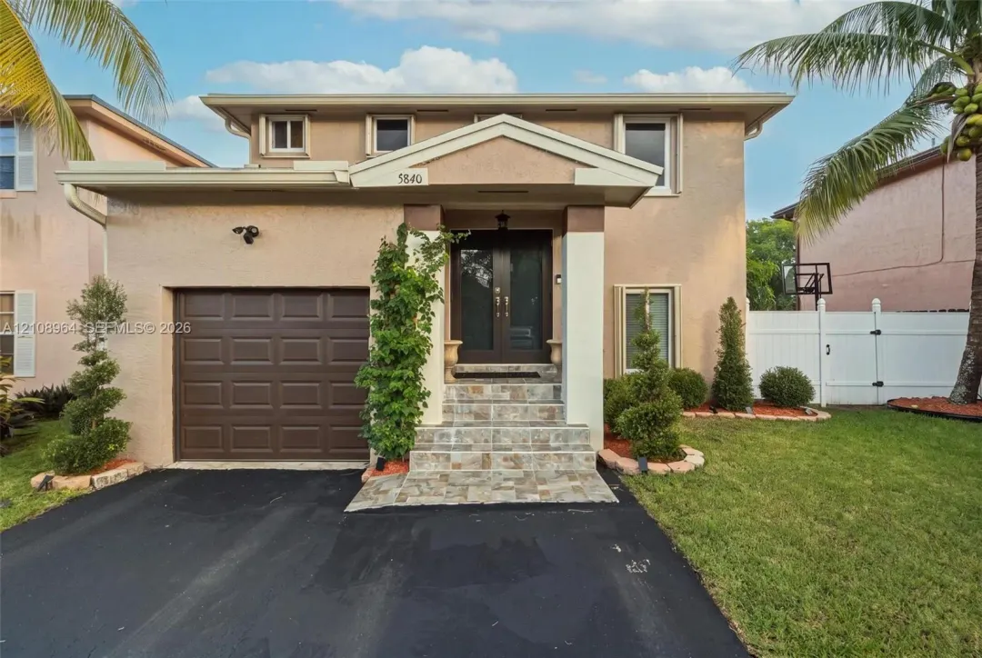 5840 Woodland Point Drive, Tamarac, FL 33319