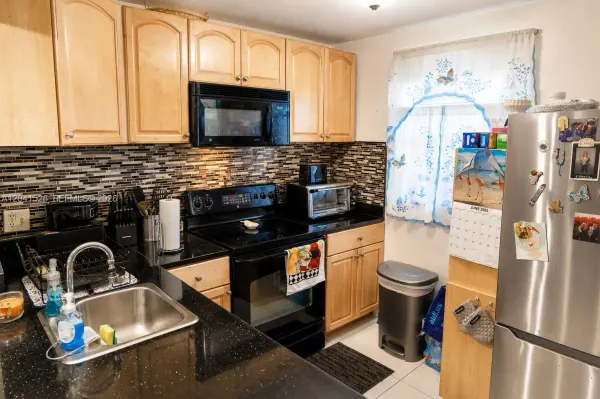 12014 S Greenway Circle S 105, Royal Palm Beach, FL 33411