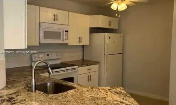 8977 Wiles Road 103, Coral Springs, FL 33067