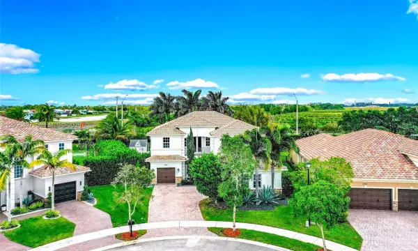8766 Miralago Way, Parkland, FL 33076