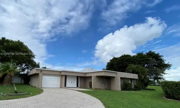 6105 Royal Poinciana Lane, Tamarac, FL 33319
