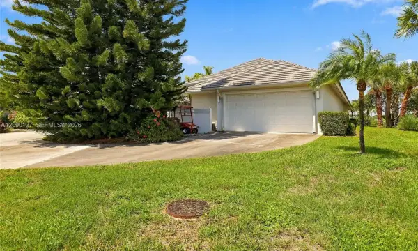 173 Orange Tree Drive, Atlantis, FL 33462