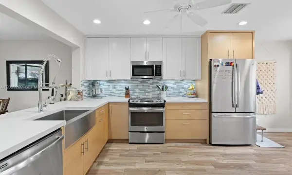 3329 Deer Creek Lake Shore Drive, Deerfield Beach, FL 33442