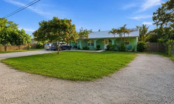309 Hach Lane, Royal Palm Estates, FL 33415
