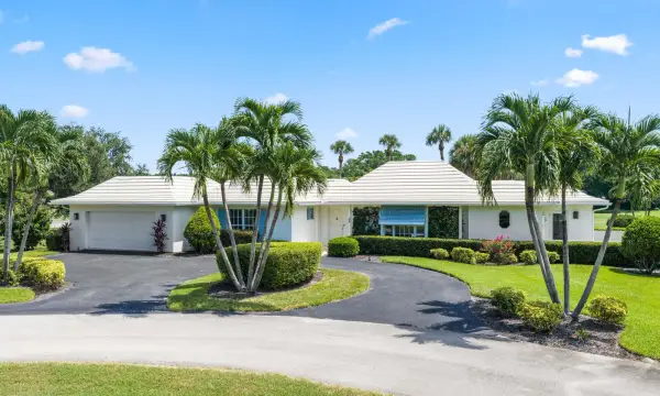 4 Country Club Circle, Village Of Golf, FL 33436