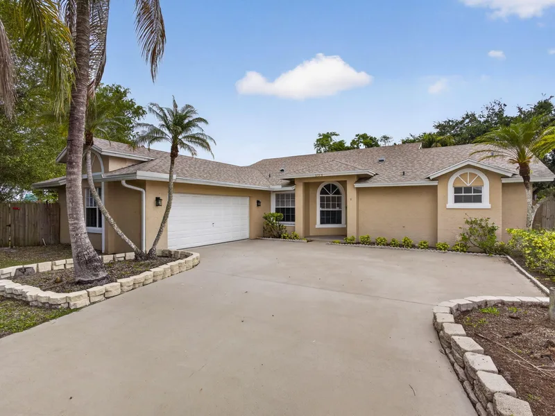 103 Oxford Court, Royal Palm Beach, FL 33411